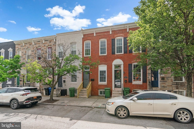 1213 Washington Blvd, Baltimore, MD 21230 - view of front of home with entry steps and brick siding