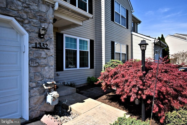 view of home's exterior with stone siding