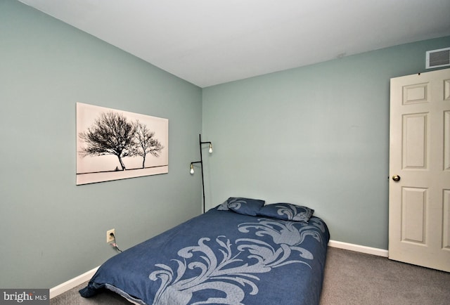 bedroom featuring carpet floors, baseboards, and visible vents