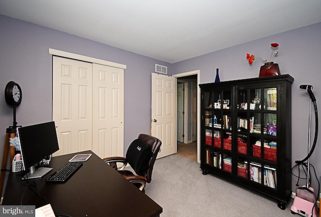 carpeted home office with visible vents