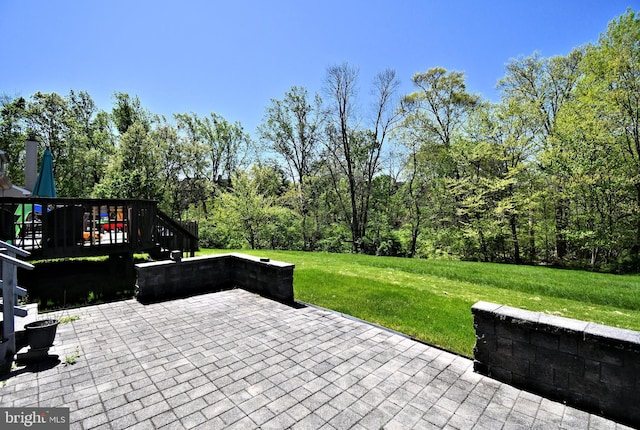 view of patio with a wooden deck