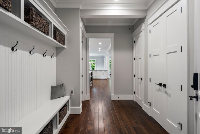 mudroom featuring dark wood-type flooring, recessed lighting, baseboards, and crown molding