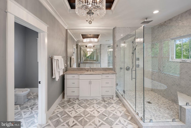full bath with a bidet, vanity, an inviting chandelier, a shower stall, and baseboards