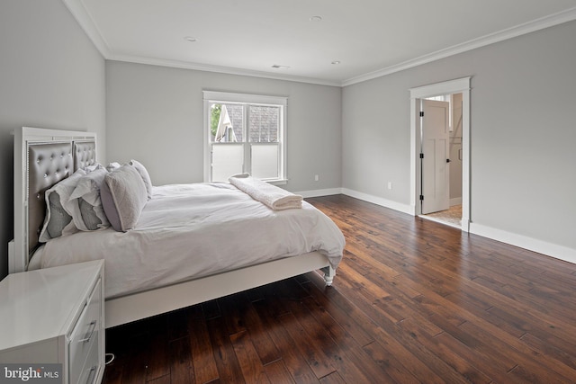 bedroom featuring ornamental molding, baseboards, and hardwood / wood-style floors