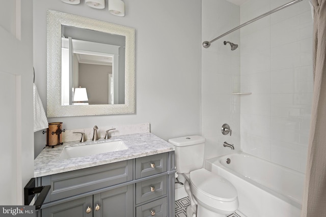 full bath featuring toilet, vanity, and shower / tub combination