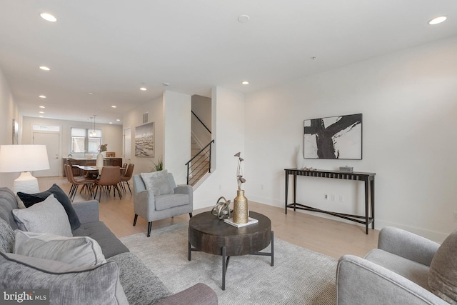 740 S Columbus Blvd Unit 74, Philadelphia, PA 19147 - living room featuring stairway, light wood-type flooring, and recessed lighting