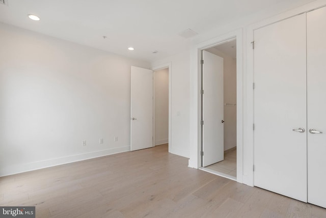 740 S Columbus Blvd Unit 74, Philadelphia, PA 19147 - unfurnished bedroom with light wood-style floors, recessed lighting, and a closet