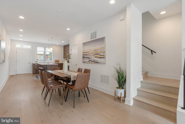 740 S Columbus Blvd Unit 74, Philadelphia, PA 19147 - dining area featuring light wood-style flooring, recessed lighting, and stairs