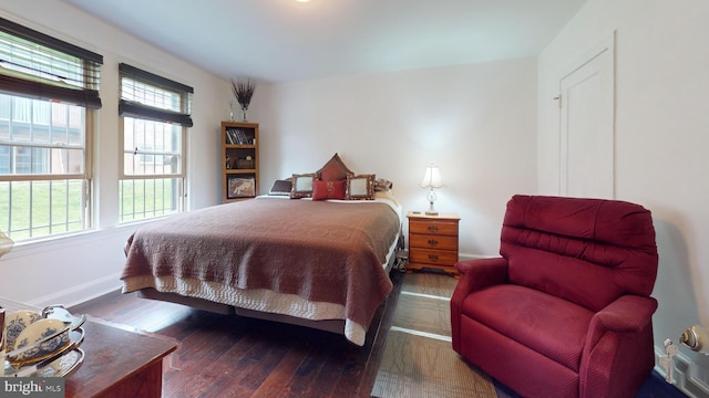 4408 1st Pl NE Unit 14, Washington, DC 20011 - bedroom with multiple windows, hardwood / wood-style floors, and baseboards