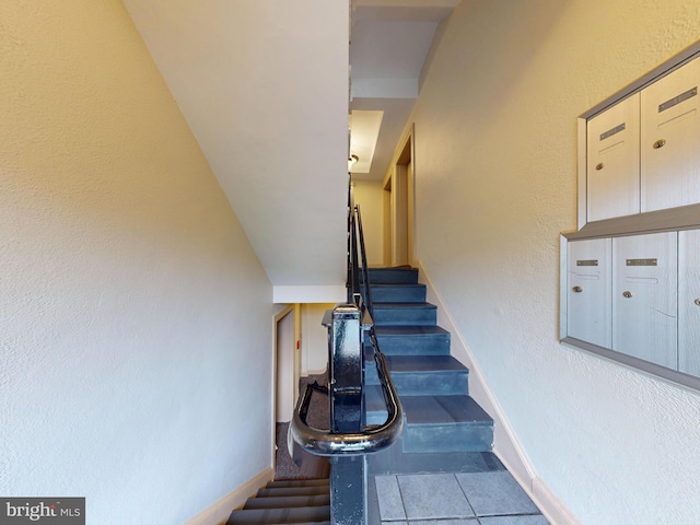 4408 1st Pl NE Unit 14, Washington, DC 20011 - stairway with baseboards and tile patterned flooring