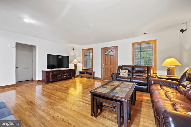1218 Lower Ferry Rd, Ewing, NJ 08618 - living room featuring light wood-style flooring and baseboards