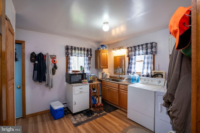 505 Deibler Rd, Pennsylvania Furnace, PA 16865 - washroom with washer and dryer, a sink, and light wood-type flooring