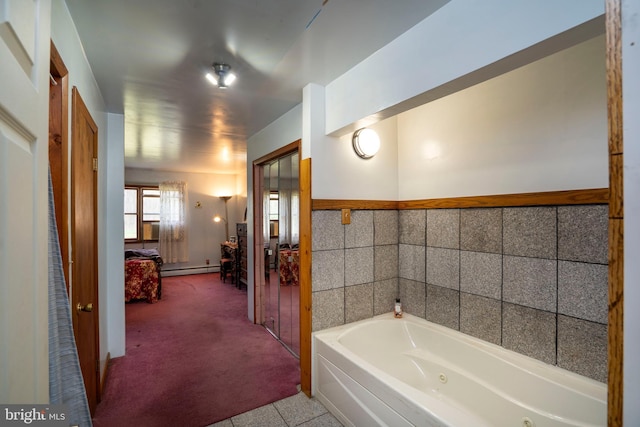 505 Deibler Rd, Pennsylvania Furnace, PA 16865 - bathroom featuring a tub with jets and a baseboard heating unit