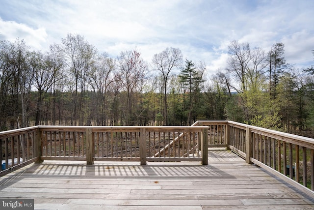 505 Deibler Rd, Pennsylvania Furnace, PA 16865 - wooden terrace featuring a view of trees