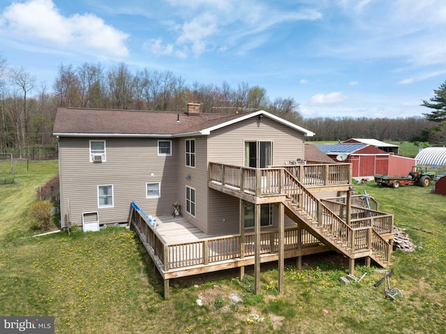 505 Deibler Rd, Pennsylvania Furnace, PA 16865 - rear view of property featuring a lawn, stairway, a wooden deck, and a chimney