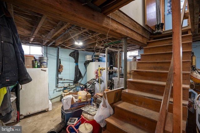 505 Deibler Rd, Pennsylvania Furnace, PA 16865 - below grade area featuring stairway, water heater, washing machine and dryer, and fridge