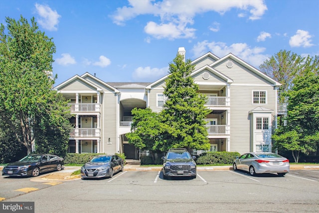 1704 Lake Shore Crest Dr Unit 32, Reston, VA 20190 - view of property featuring uncovered parking