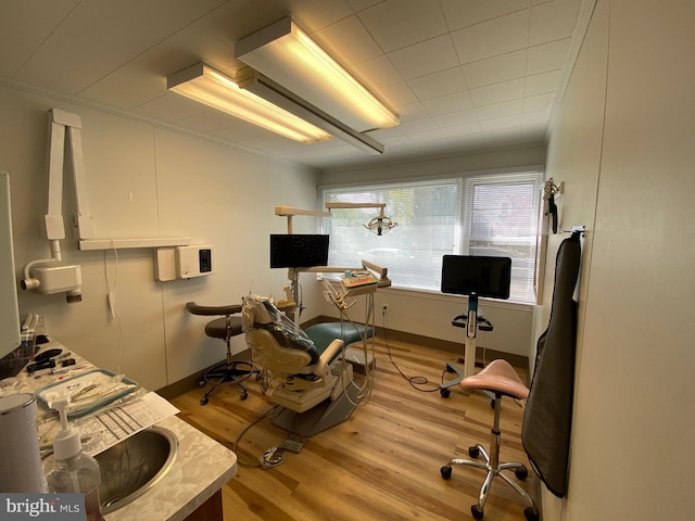 office space with light wood-style floors
