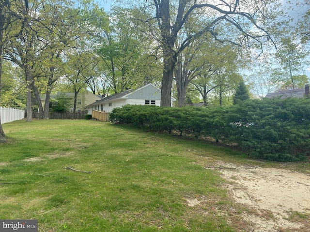 view of yard with fence