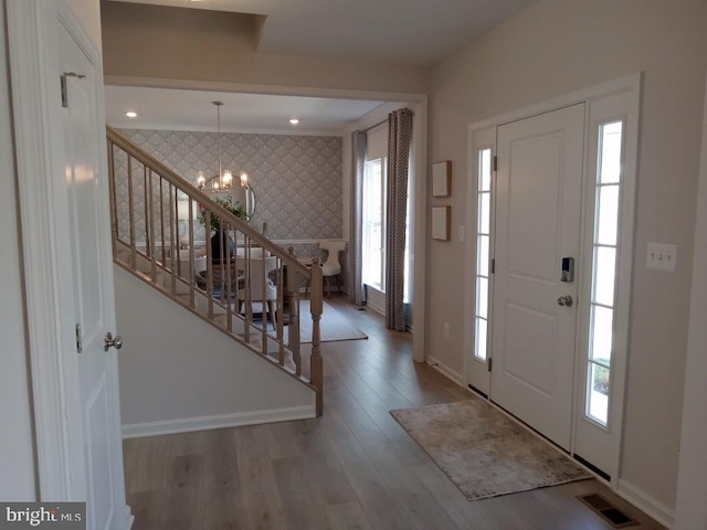 16497 Northwestern Pike, Augusta, WV 26704 - foyer entrance with baseboards, wallpapered walls, visible vents, and a healthy amount of sunlight