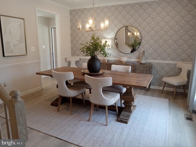 16497 Northwestern Pike, Augusta, WV 26704 - dining space featuring wallpapered walls, an inviting chandelier, baseboards, and visible vents