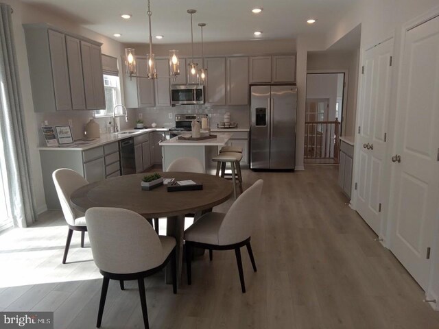 16497 Northwestern Pike, Augusta, WV 26704 - dining room featuring recessed lighting, a notable chandelier, and light wood-type flooring