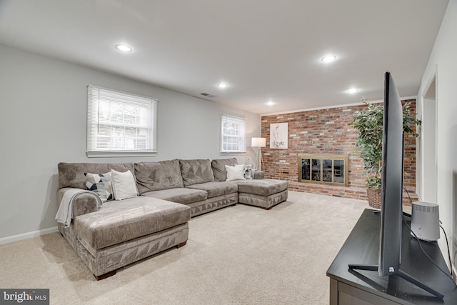 carpeted living room with visible vents, recessed lighting, baseboards, and a fireplace