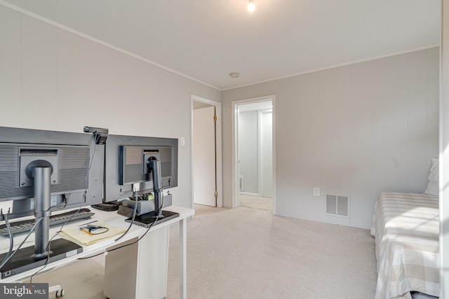 office featuring visible vents, ornamental molding, and carpet