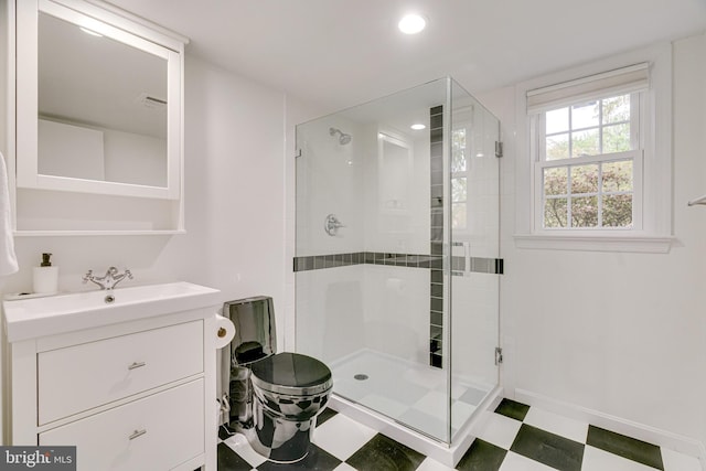 bathroom with vanity, tile patterned floors, a shower stall, and recessed lighting