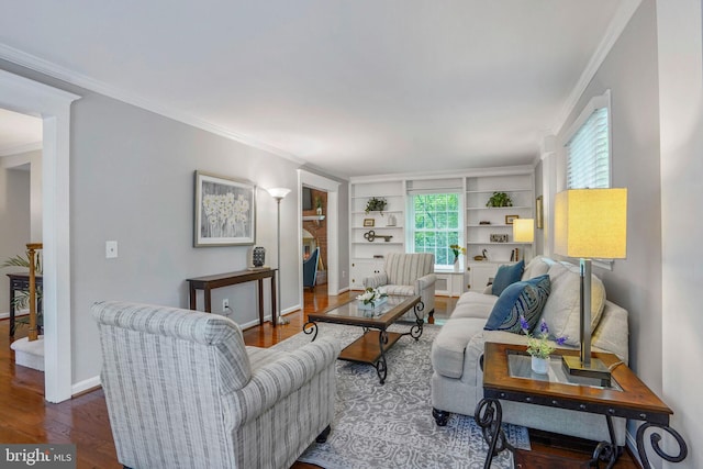 living room featuring crown molding and wood finished floors