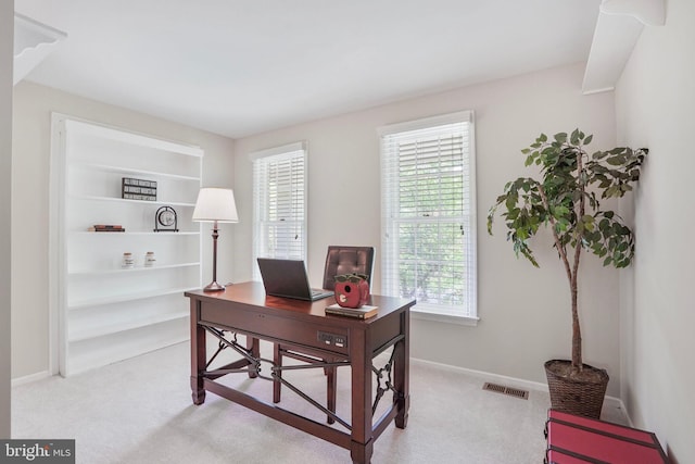 office featuring baseboards, carpet, and visible vents