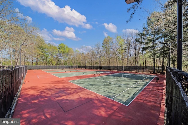 view of sport court with fence and community basketball court