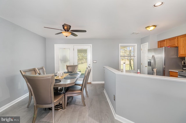 dining space featuring ceiling fan, visible vents, wood finished floors, baseboards, and recessed lighting