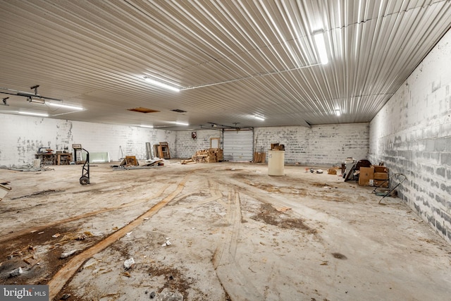 misc room with a garage