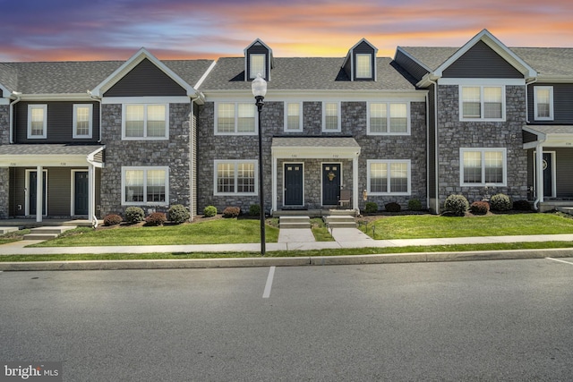 730 Farmwood Ln, Lebanon, PA 17042 - view of property featuring stone siding, a yard, and roof with shingles