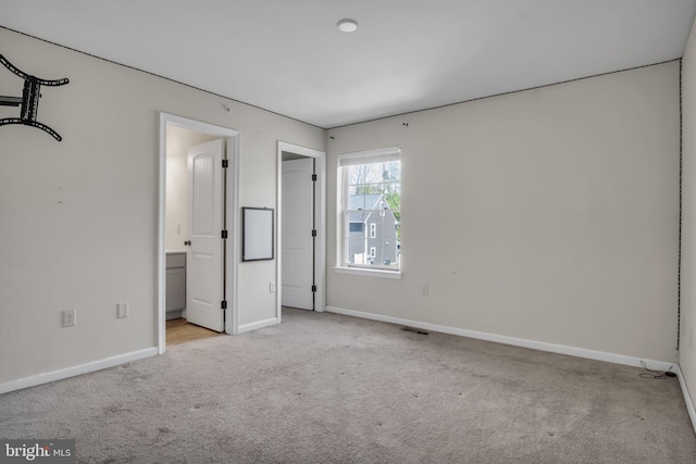 730 Farmwood Ln, Lebanon, PA 17042 - unfurnished bedroom featuring carpet floors, baseboards, and ensuite bathroom