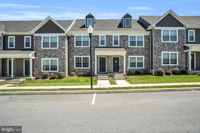 730 Farmwood Ln, Lebanon, PA 17042 - view of property featuring stone siding, a front yard, and roof with shingles