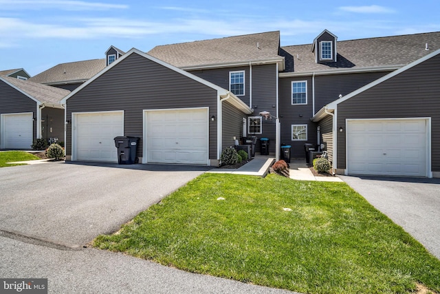 730 Farmwood Ln, Lebanon, PA 17042 - view of front of house featuring a shingled roof, driveway, a front lawn, and a garage