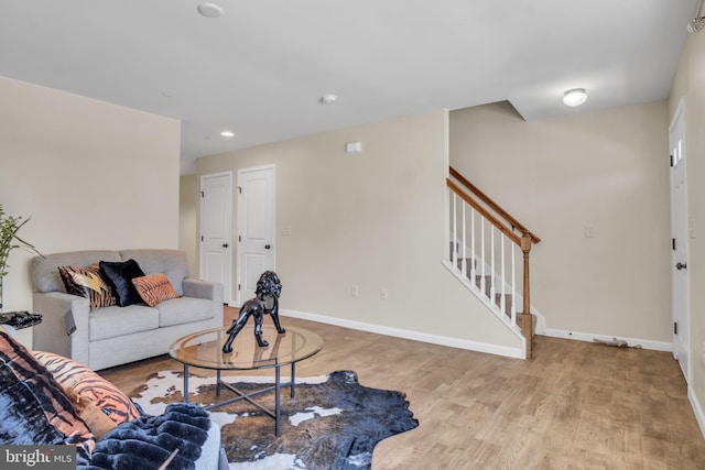 730 Farmwood Ln, Lebanon, PA 17042 - living area featuring wood finished floors, stairway, baseboards, and recessed lighting