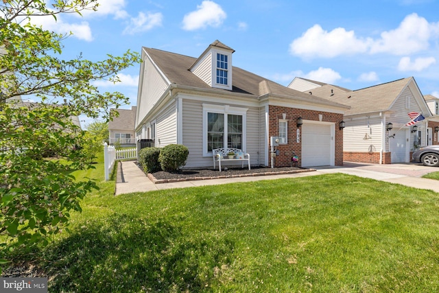 view of front of house featuring driveway, an attached garage, fence, and a front yard