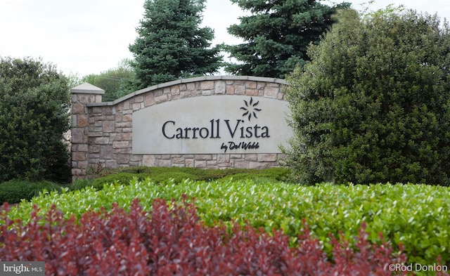 view of community sign
