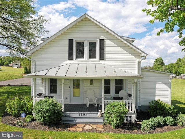 1691 Wakeman Mill Rd, Front Royal, VA 22630 - rear view of house with a porch, metal roof, a standing seam roof, and a yard