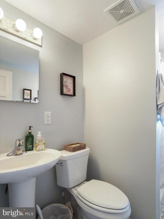 1691 Wakeman Mill Rd, Front Royal, VA 22630 - bathroom featuring toilet and visible vents