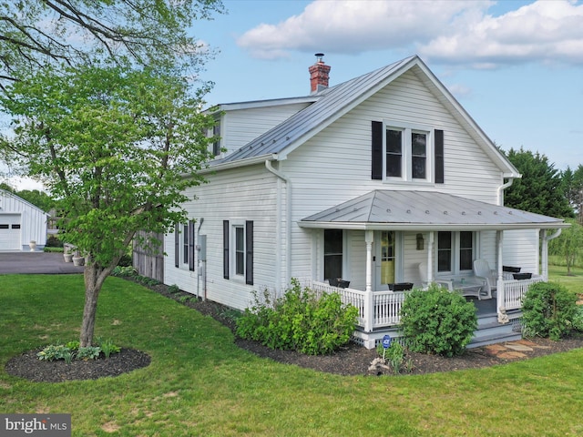 1691 Wakeman Mill Rd, Front Royal, VA 22630 - view of front facade featuring covered porch, metal roof, a chimney, and a front yard