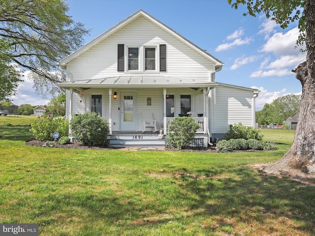 1691 Wakeman Mill Rd, Front Royal, VA 22630 - view of front of property with covered porch, a front yard, and a standing seam roof
