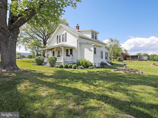 1691 Wakeman Mill Rd, Front Royal, VA 22630 - view of side of home featuring a chimney, a porch, and a lawn