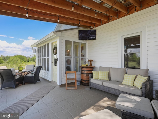 1691 Wakeman Mill Rd, Front Royal, VA 22630 - view of patio / terrace featuring an outdoor hangout area, a sunroom, and outdoor dining space