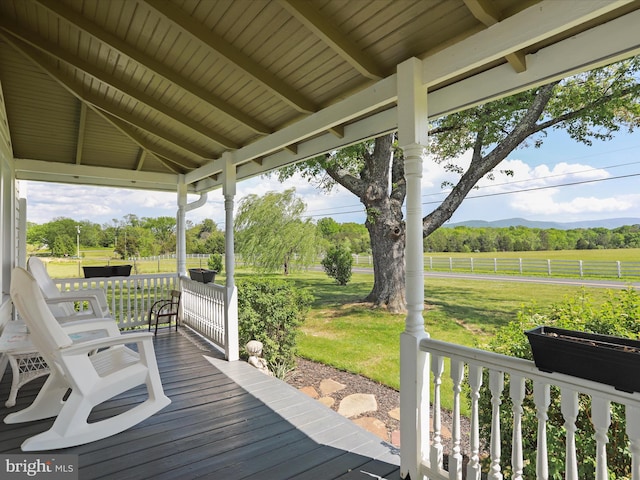 1691 Wakeman Mill Rd, Front Royal, VA 22630 - deck with a yard, a rural view, covered porch, and fence