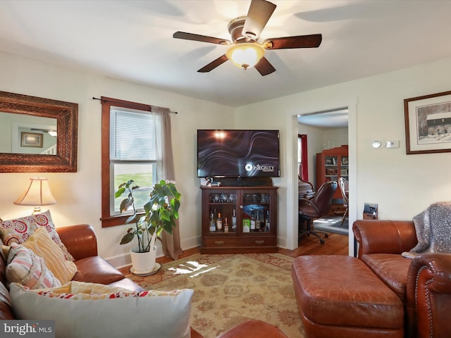 1691 Wakeman Mill Rd, Front Royal, VA 22630 - living area with wood finished floors, baseboards, and ceiling fan