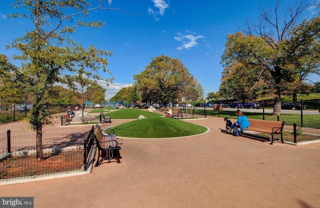 surrounding community featuring fence